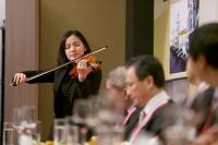 Miss Chang Ho Ting giving a violin performance